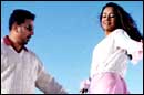 Kamal Haasan and Jyotika in Thenali