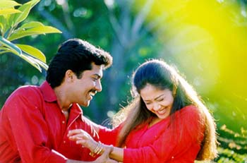 Surya and Jyotika in Poovellam Kettupaar