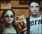Erika Christensen and Topher Grace in Traffic