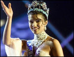 A jubiliant Priyanka waves out to a hysterical crowd as Miss World