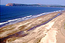 Whale back feature with Ratnagiri's lighthouse and Bhatya beach in the
foreground